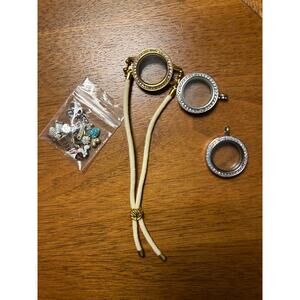 Origami Owl Lot. Three floating locket 
pendants and a bunch of charms.